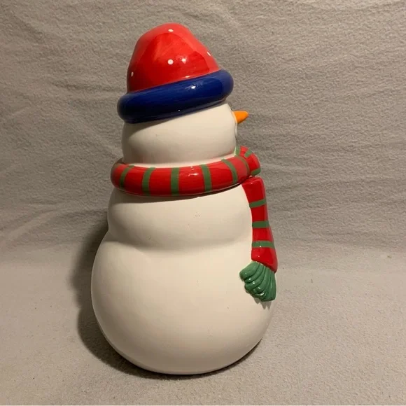 Holiday Snowman Cookie Jar with Santa’s red hat and red/green striped scarf. - Picture 6 of 8